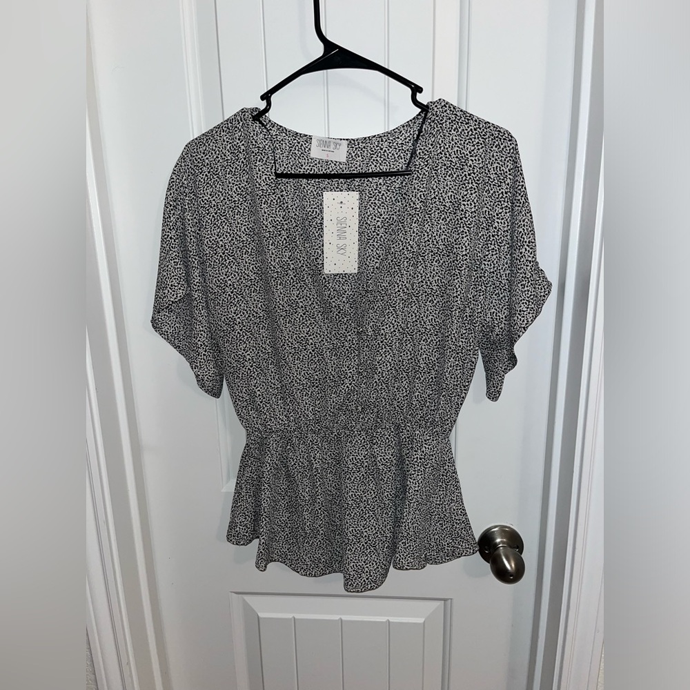 Peplum going out top